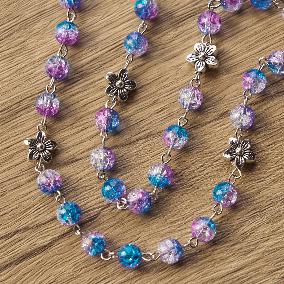 AMUSOUL Seven Sorrow of 8 mm Round Blue-Purple Gradient Rosary with Floral - Carved Our Lady of Sorrows Pendant