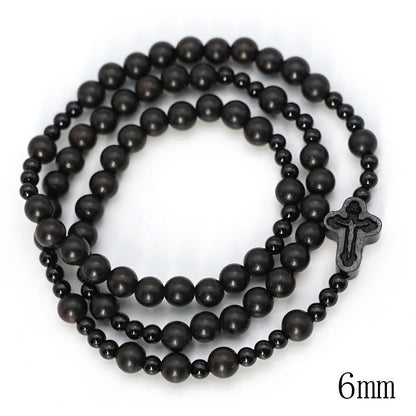 AMUSOUL Crucifix of 6*8 mm Round Black Sandalwood Nylon Cord Rosary