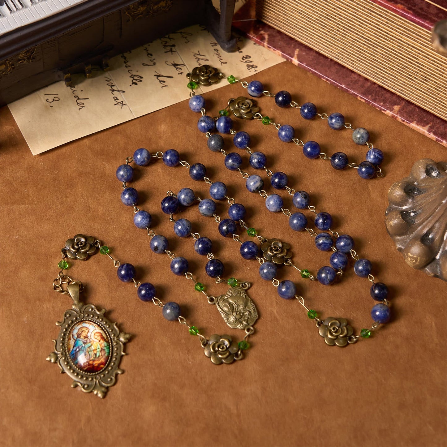 AMUSOUL Handmade Rosary with Lapis Beads and Floral Medallion – A Divine Reflection of Family and Faith