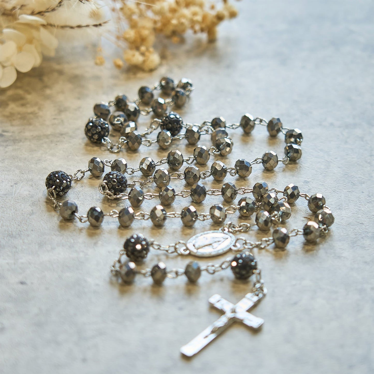 AMUSOUL Colorful Shiny Black Crystal Radiant Faith Rosary: A Spiritual and Aesthetic Delight