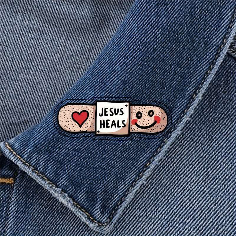 AMUSOUL  Jesus Heals Acrylic Heart Band-Aid Brooch: A Symbol of Faith and Comfort