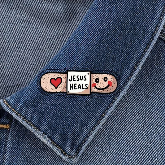 AMUSOUL  Jesus Heals Acrylic Heart Band-Aid Brooch: A Symbol of Faith and Comfort