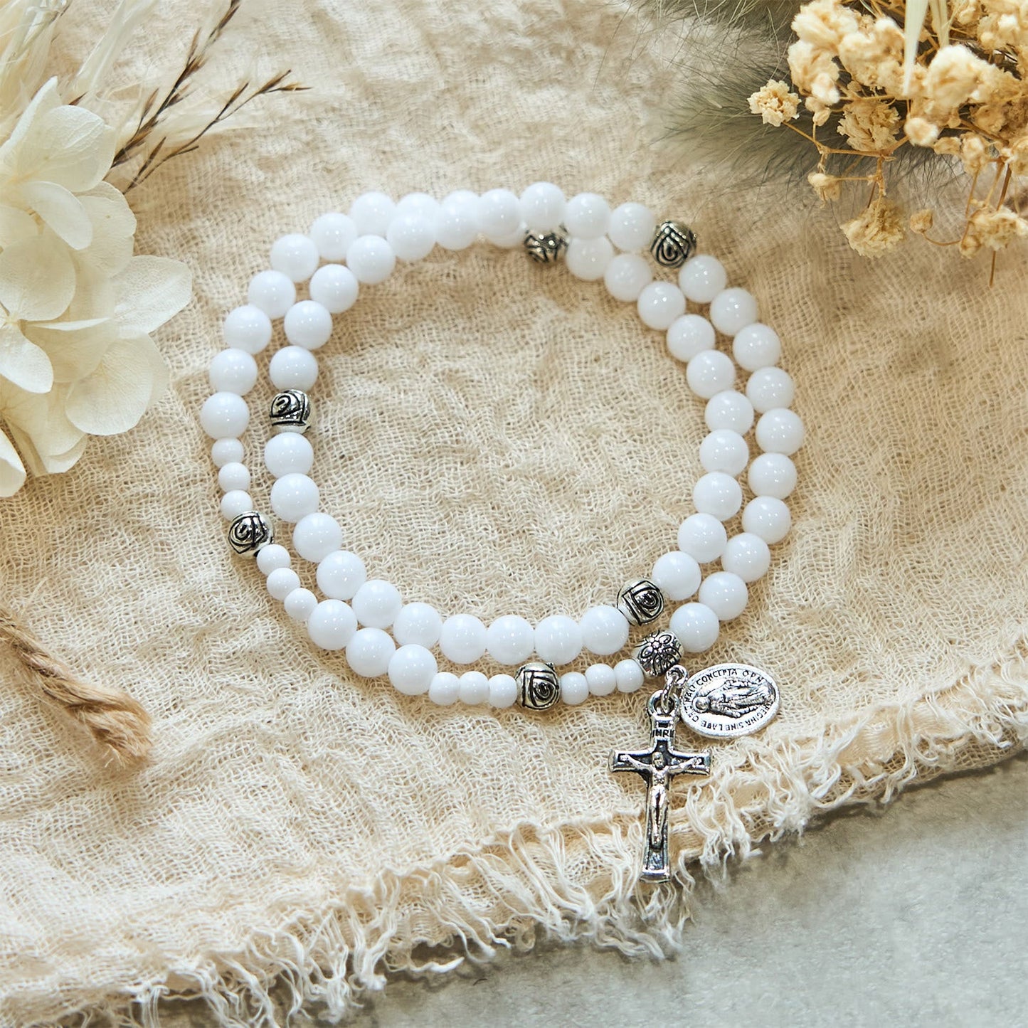 AMUSOUL  6mm White Bead Miraculous Medal & Crucifix Rosary Bracelet: A Symbol of Faith