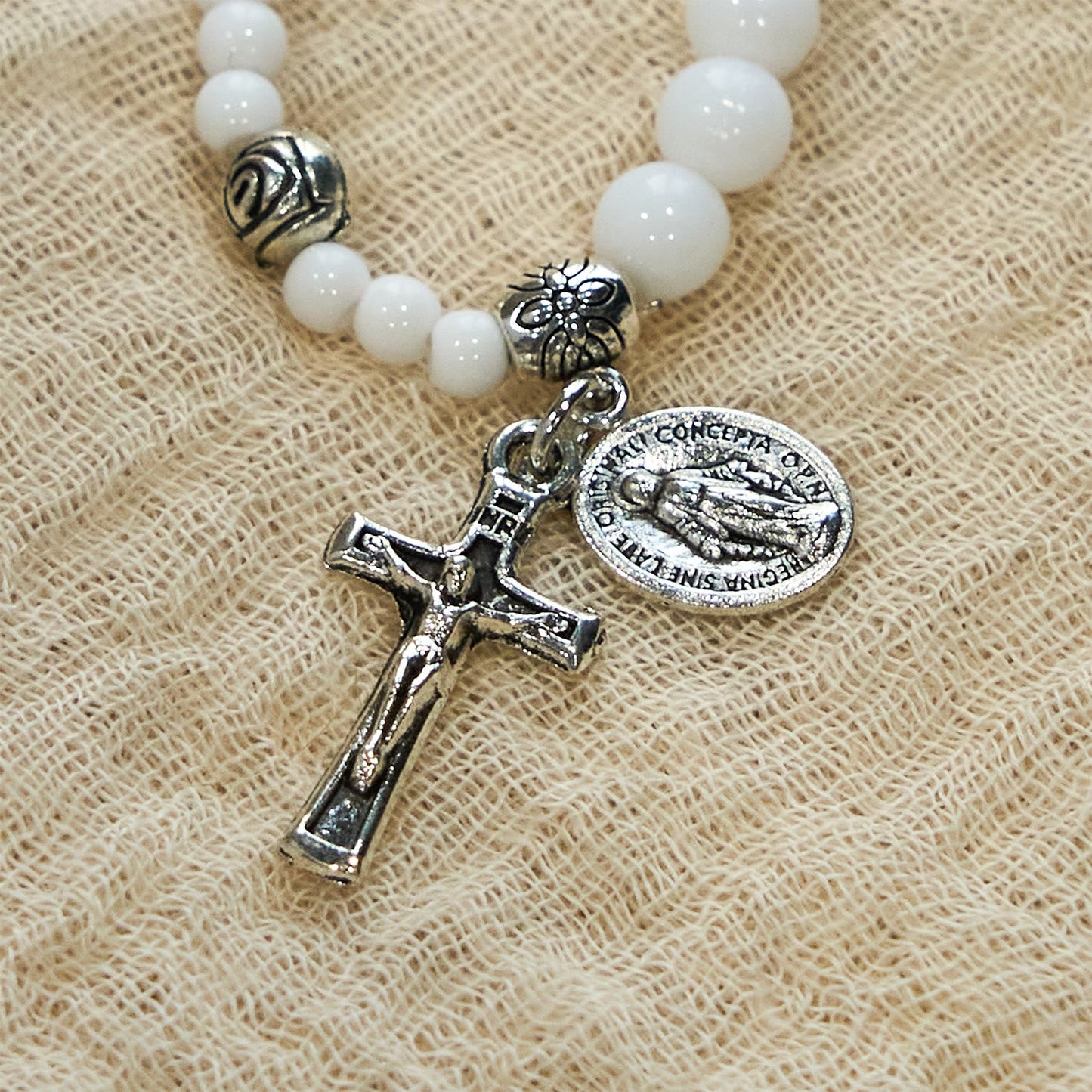 AMUSOUL  6mm White Bead Miraculous Medal & Crucifix Rosary Bracelet: A Symbol of Faith