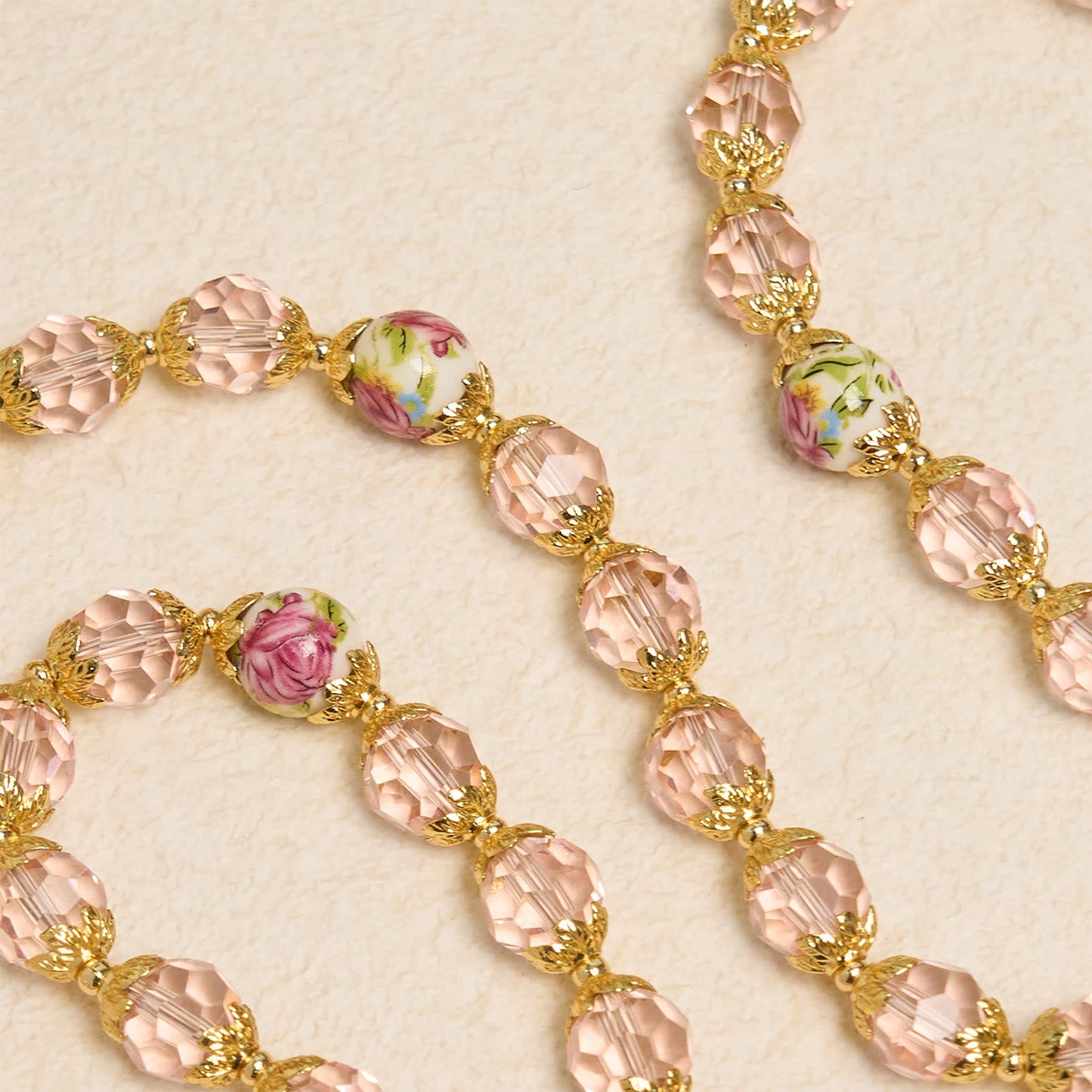 AMUSOUL Pink Crystal Beads with Golden Alloy Chain Crucifix & Virgin Mary Prayer Rosary