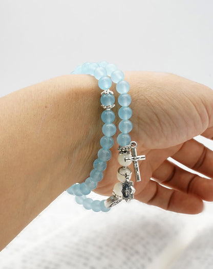 AMUSOUL  6mm Light Blue Bead Miraculous Medal & Crucifix Minimalist Bracelet: A Symbol of Faith