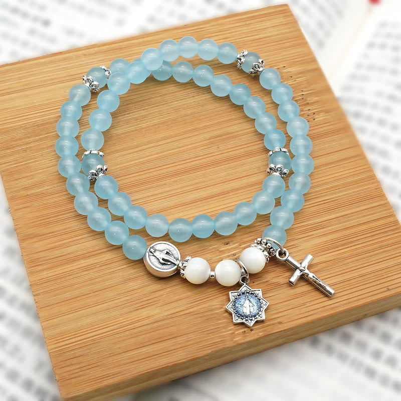 AMUSOUL  6mm Light Blue Bead Miraculous Medal & Crucifix Minimalist Bracelet: A Symbol of Faith