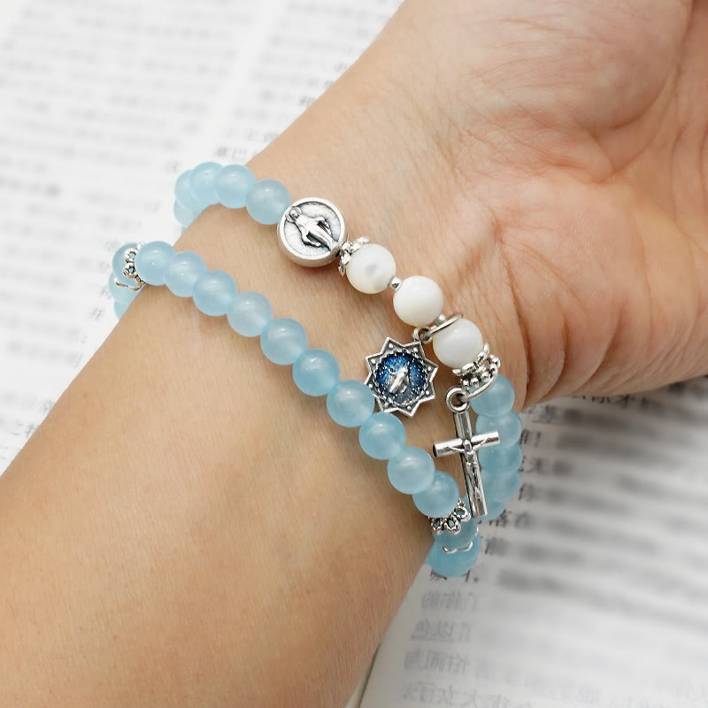 AMUSOUL  6mm Light Blue Bead Miraculous Medal & Crucifix Minimalist Bracelet: A Symbol of Faith