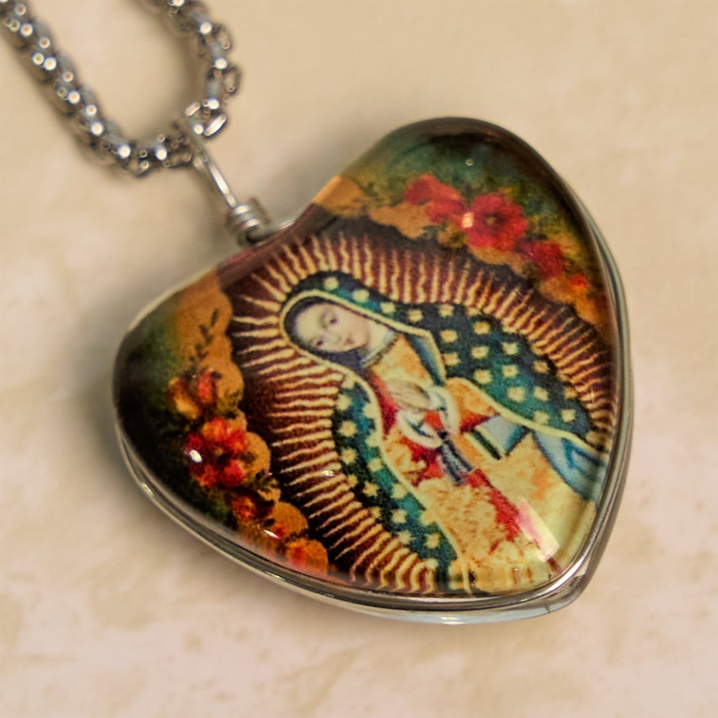 AMUSOUL  Black Our Lady of Guadalupe Glow-in-the-Dark Heart Shaped Resin Medal Necklace