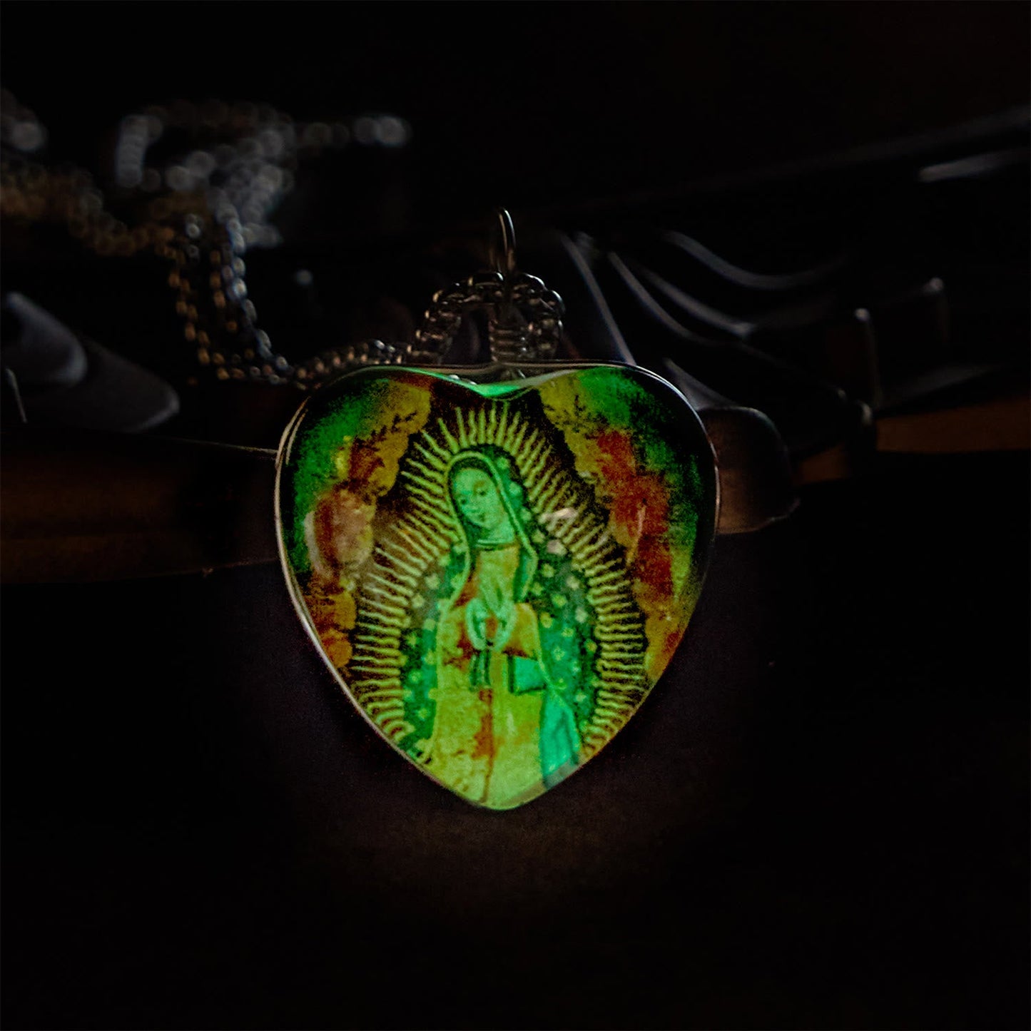 AMUSOUL  Black Our Lady of Guadalupe Glow-in-the-Dark Heart Shaped Resin Medal Necklace